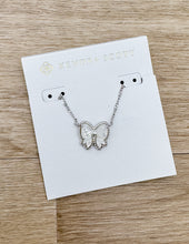 Load image into Gallery viewer, Kendra Scott Haley Bow Short Pendant Necklace in Silver/Ivory MOP