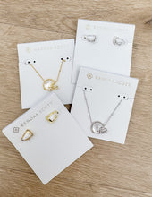 Load image into Gallery viewer, Kendra Scott Football Helmet Pendant Necklace in Silver/Ivory MOP